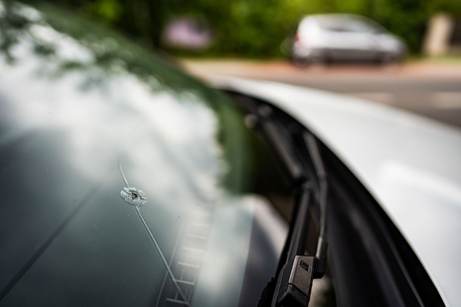 Technician preparing a quote for a windshield replacement